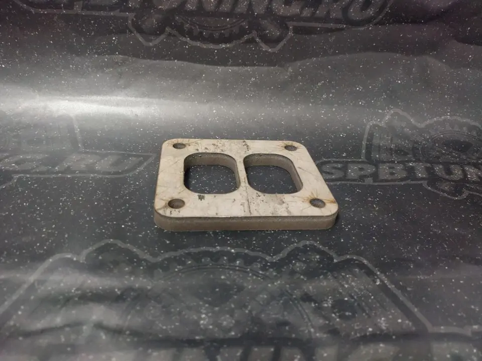 Фланец Tuning Toys под турбину Т4 twin scroll нерж.